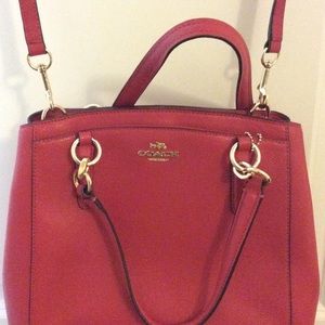 Coach handbag with strap